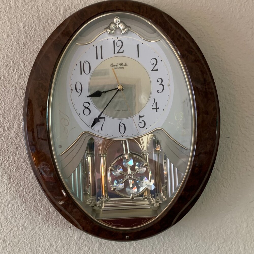 Small World Rhythm Joyful Snowflake Walnut Sound & Movement Clock